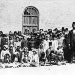Abul Khasib March 1917 [Group of Arab children - possibly a school class, and three men]
